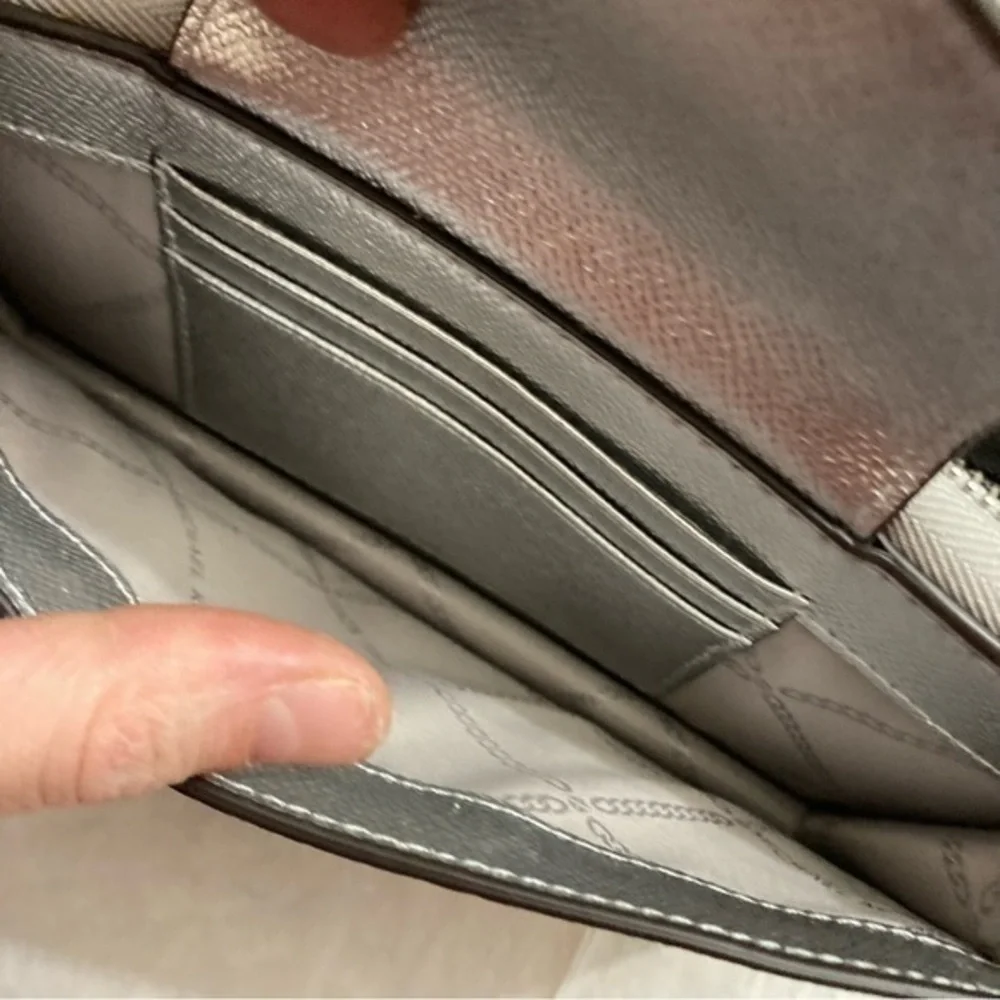 Michael Kors silver clutch bag